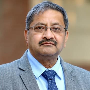 Dr. Himanshu Garg sitting on a chair